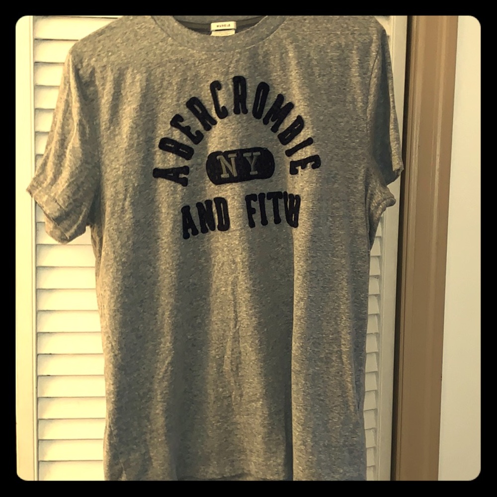 Gray Abercrombie And Fitch tee.